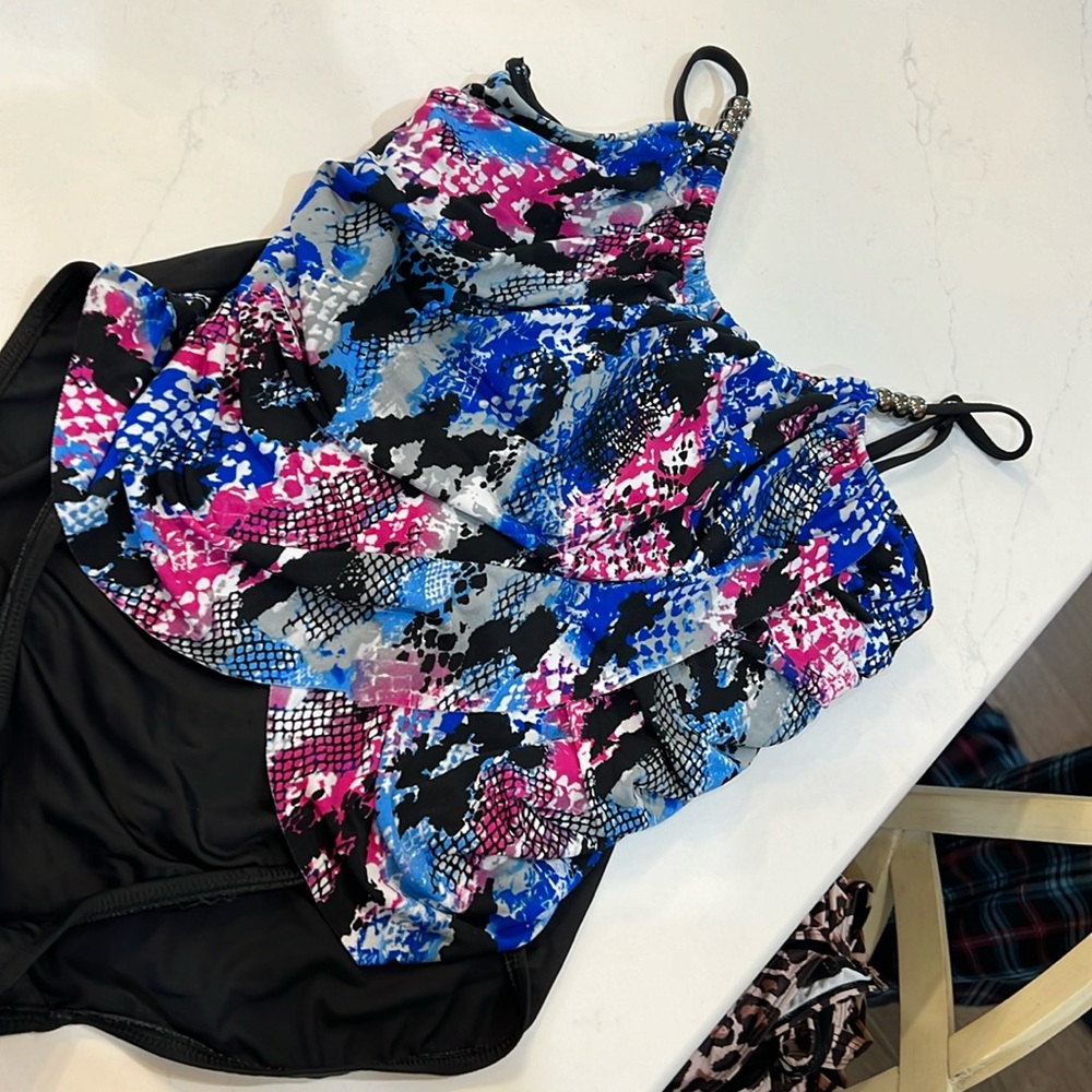 Tummy control swim suit. Holds it all in.